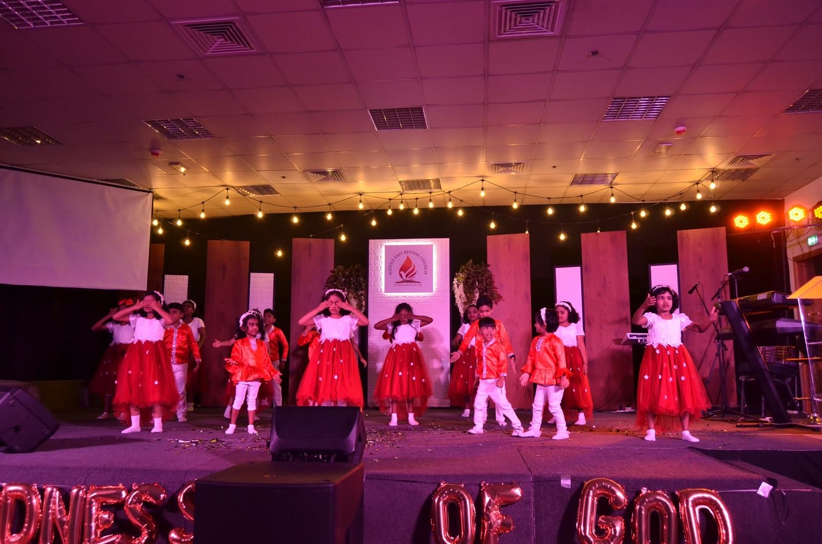 Little ones performing a dance at Kids Church